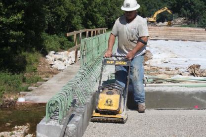 Precast Prestressed Concrete Pavement to Abate Settlement Problems Under Bridge Approach Slabs