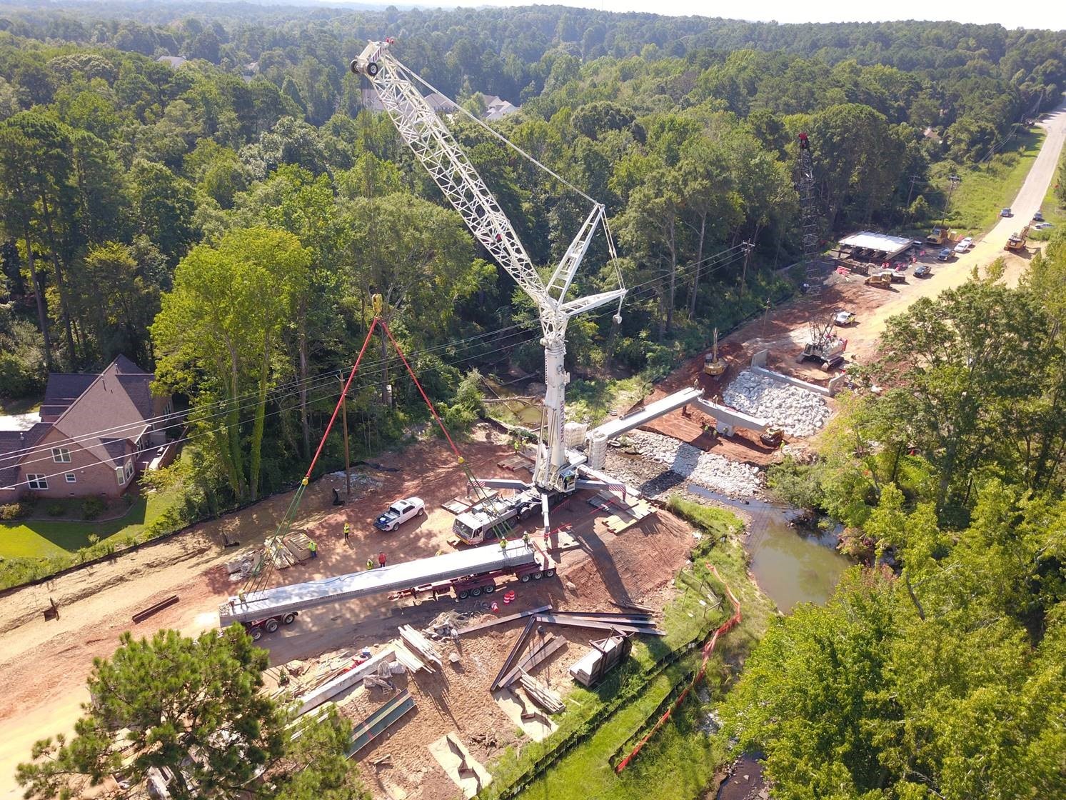 Erection of modular decked beams