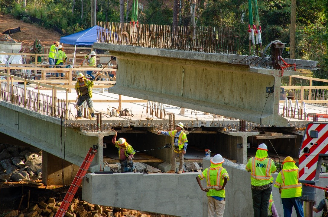 Erection of modular decked beams